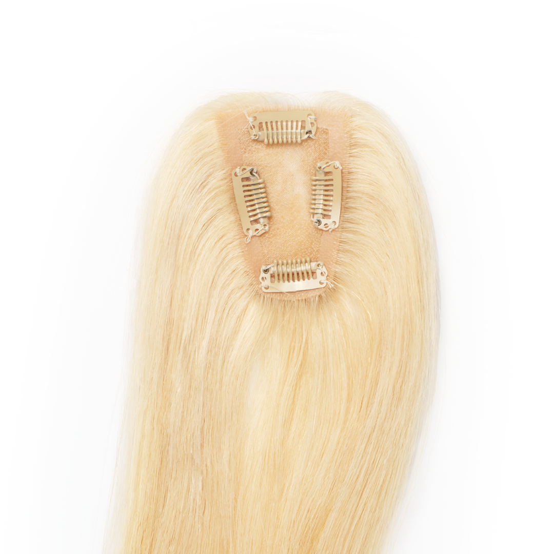 Bottom of Bangin 3x2" Hair Topper with 4 clips to secure hair piece on the crown or part of the head.